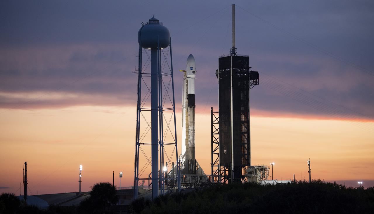 A SpaceX Falcon 9 rocket carrying NASA’s Imaging X-ray Polarimetry Explorer (IXPE) spacecraft is seen at sunset on the launch pad at Launch Complex 39A, Wednesday, Dec. 8, 2021, at NASA’s Kennedy Space Center in Florida. The IXPE spacecraft is the first satellite dedicated to measuring the polarization of X-rays from a variety of cosmic sources, such as black holes and neutron stars. Photo Credit: (NASA/Joel Kowsky)