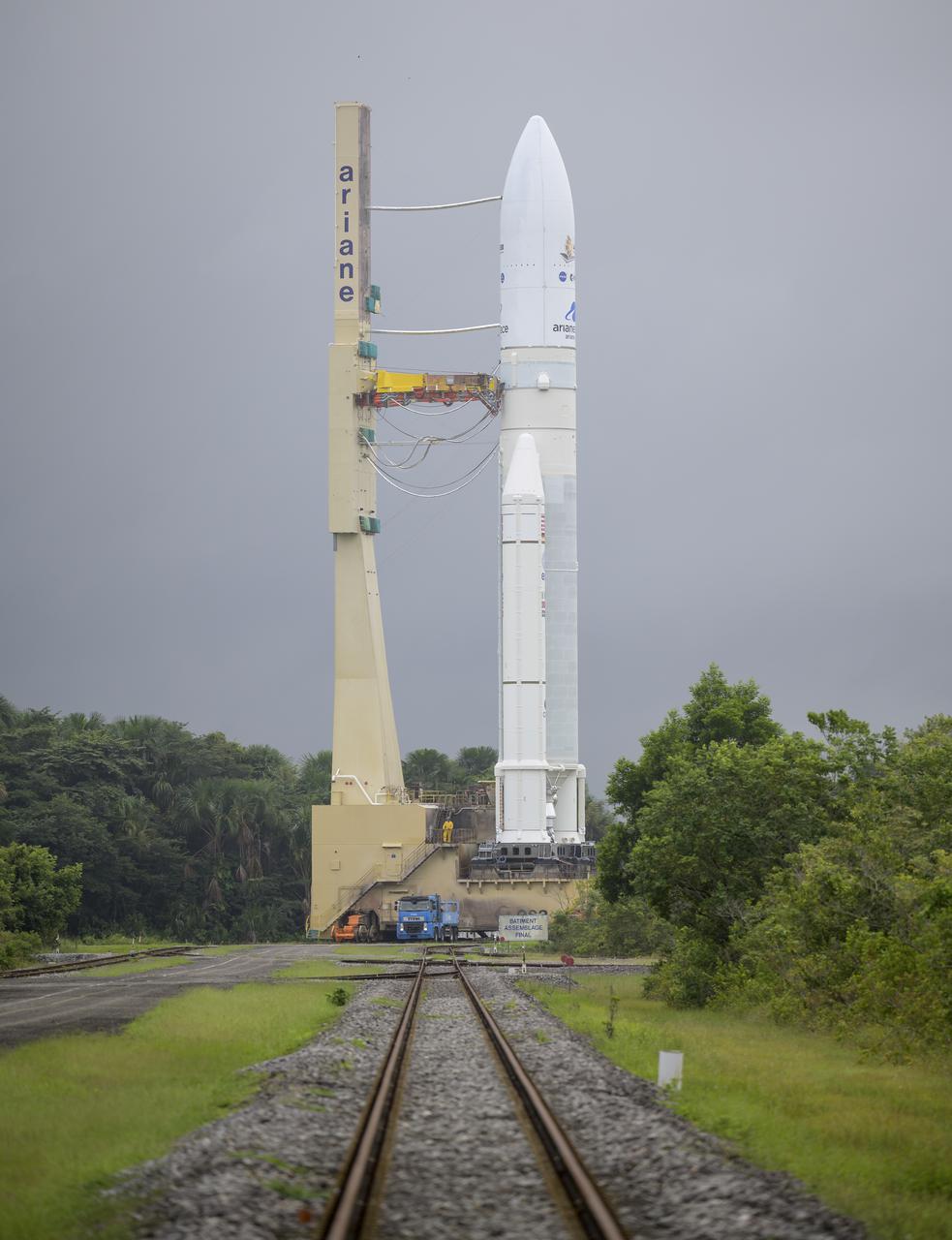 Arianespace's Ariane 5 rocket with NASA’s James Webb Space Telescope onboard, is rolled out to the launch pad, Thursday, Dec. 23, 2021, at Europe’s Spaceport, the Guiana Space Center in Kourou, French Guiana. The James Webb Space Telescope (sometimes called JWST or Webb) is a large infrared telescope with a 21.3 foot (6.5 meter) primary mirror. The observatory will study every phase of cosmic history—from within our solar system to the most distant observable galaxies in the early universe. Photo Credit: (NASA/Bill Ingalls)
