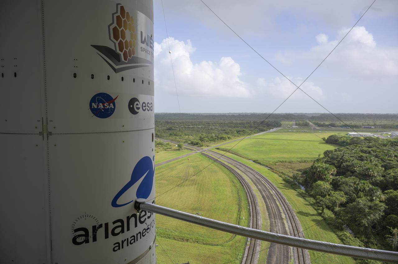 Arianespace's Ariane 5 rocket with NASA’s James Webb Space Telescope onboard, is seen ahead of rollout to the launch pad, Thursday, Dec. 23, 2021, at Europe’s Spaceport, the Guiana Space Center in Kourou, French Guiana. The James Webb Space Telescope (sometimes called JWST or Webb) is a large infrared telescope with a 21.3 foot (6.5 meter) primary mirror. The observatory will study every phase of cosmic history—from within our solar system to the most distant observable galaxies in the early universe. Photo Credit: (NASA/Bill Ingalls)