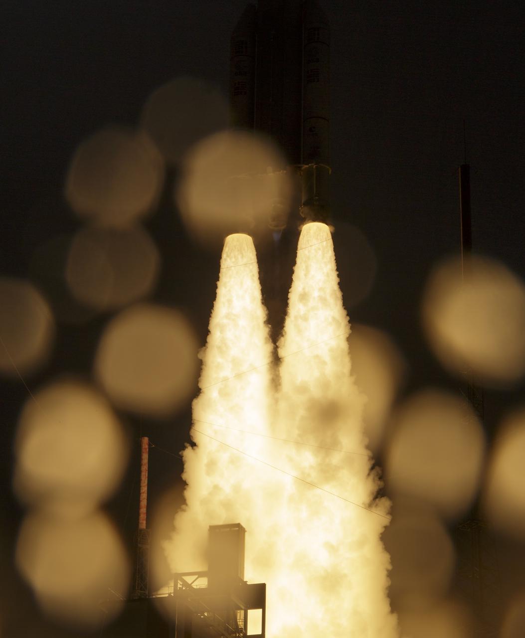 Arianespace's Ariane 5 rocket launches with NASA’s James Webb Space Telescope onboard, Saturday, Dec. 25, 2021, from the ELA-3 Launch Zone of Europe’s Spaceport at the Guiana Space Centre in Kourou, French Guiana. The James Webb Space Telescope (sometimes called JWST or Webb) is a large infrared telescope with a 21.3 foot (6.5 meter) primary mirror. The observatory will study every phase of cosmic history—from within our solar system to the most distant observable galaxies in the early universe. Photo Credit: (NASA/Bill Ingalls)