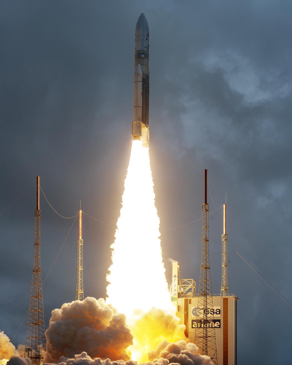 Arianespace's Ariane 5 rocket launches with NASA’s James Webb Space Telescope onboard, Saturday, Dec. 25, 2021, from the ELA-3 Launch Zone of Europe’s Spaceport at the Guiana Space Centre in Kourou, French Guiana. The James Webb Space Telescope (sometimes called JWST or Webb) is a large infrared telescope with a 21.3 foot (6.5 meter) primary mirror. The observatory will study every phase of cosmic history—from within our solar system to the most distant observable galaxies in the early universe. Photo Credit: (NASA/Chris Gunn)