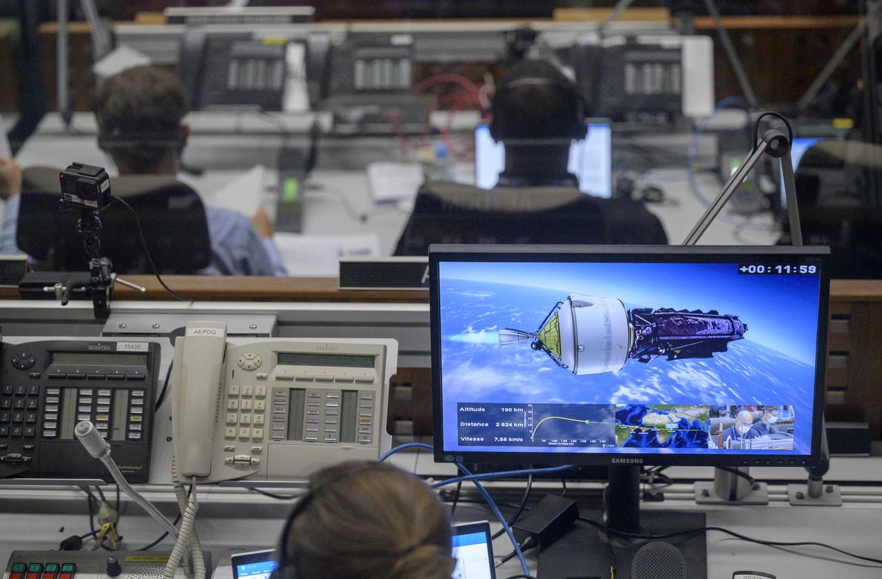 Launch teams monitor the flight progress of Arianespace's Ariane 5 rocket carrying NASA’s James Webb Space Telescope, Saturday, Dec. 25, 2021, in the Jupiter Center at the Guiana Space Center in Kourou, French Guiana. The James Webb Space Telescope (sometimes called JWST or Webb) is a large infrared telescope with a 21.3 foot (6.5 meter) primary mirror. The observatory will study every phase of cosmic history—from within our solar system to the most distant observable galaxies in the early universe. Photo Credit: (NASA/Bill Ingalls)