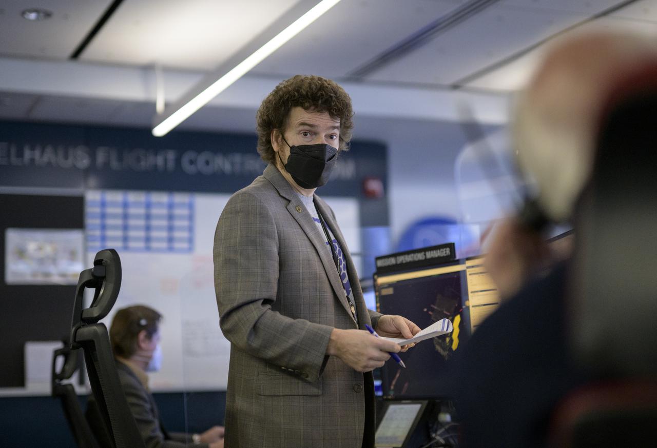 NASA James Webb Space Telescope Mission Operations Manager Carl Starr monitors the progress of the Webb observatory as it’s second primary mirror wing is prepared to rotate into position, Saturday, Jan. 8, 2022, from NASA’s James Webb Space Telescope Mission Operations Center at the Space Telescope Science Institute in Baltimore. Webb, an infrared telescope with a 21.3-foot (6.5-meter) primary mirror, was folded up for launch and underwent an unprecedented deployment process to unfold in space. As NASA's next flagship observatory, Webb will study every phase of cosmic history—from within our solar system to the most distant observable galaxies in the early universe. Photo Credit: (NASA/Bill Ingalls)