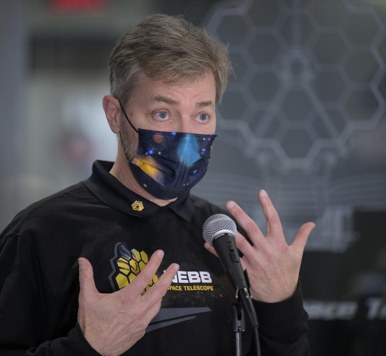 NASA James Webb Space Telescope Commissioning Manager John Durning answers questions from the media during a briefing following the successful deployment of NASA’s James Webb Space Telescope primary mirror, Saturday, Jan. 8, 2022, from the Webb Space Telescope Mission Operations Center at the Space Telescope Science Institute in Baltimore. With Webb’s 21.3-foot (6.5-meter) primary mirror fully deployed, the infrared observatory has completed its unprecedented process of unfolding in space to prepare for science operations. The observatory will study every phase of cosmic history—from within our solar system to the most distant observable galaxies in the early universe. Photo Credit: (NASA/Bill Ingalls)