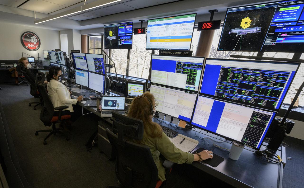 NASA James Webb Space Telescope Mission team members monitor the progress of Webb’s second primary mirror wing latching, Saturday, Jan. 8, 2022, in Baltimore. When fully latched, the infrared observatory will have completed its unprecedented process of unfolding in space to prepare for science operations. Webb will study every phase of cosmic history—from within our solar system to the most distant observable galaxies in the early universe. Photo Credit: (NASA/Bill Ingalls)