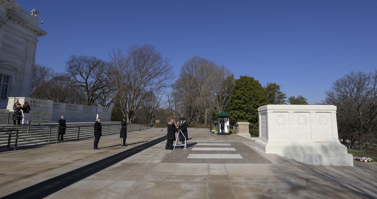 NASA Associate Administrator Bob Cabana watches as a wreath is laid at the Tomb of the Unknowns by NASA Administrator Bill Nelson and NASA Deputy Administrator Pam Melroy as part of NASA's Day of Remembrance, Thursday, Jan. 27, 2022, at Arlington National Cemetery in Arlington, Va.  The wreaths were laid in memory of those men and women who lost their lives in the quest for space exploration.  Photo Credit: (NASA/Bill Ingalls)