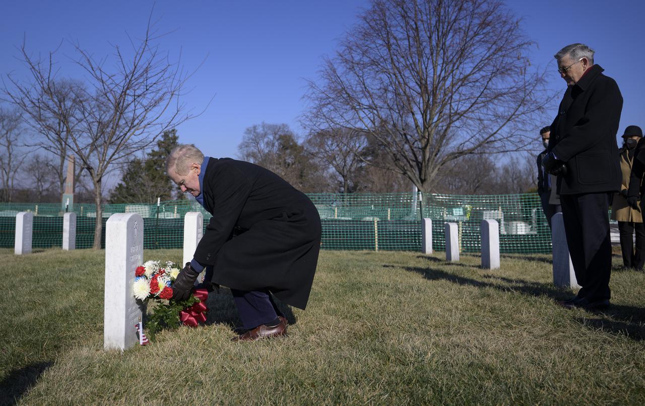 NASA Administrator Bill Nelson, left, along with NASA Deputy Administrator Pam Melroy, lay flowers at the grave markers of Virgil "Gus" Grissom and Roger Chaffee, from Apollo 1, as NASA Associate Administrator Bob Cabana looks on, during a ceremony that was part of NASA's Day of Remembrance, Thursday, Jan. 27, 2022, at Arlington National Cemetery in Arlington, Va. Wreaths were laid in memory of those men and women who lost their lives in the quest for space exploration. Photo Credit: (NASA/Bill Ingalls)