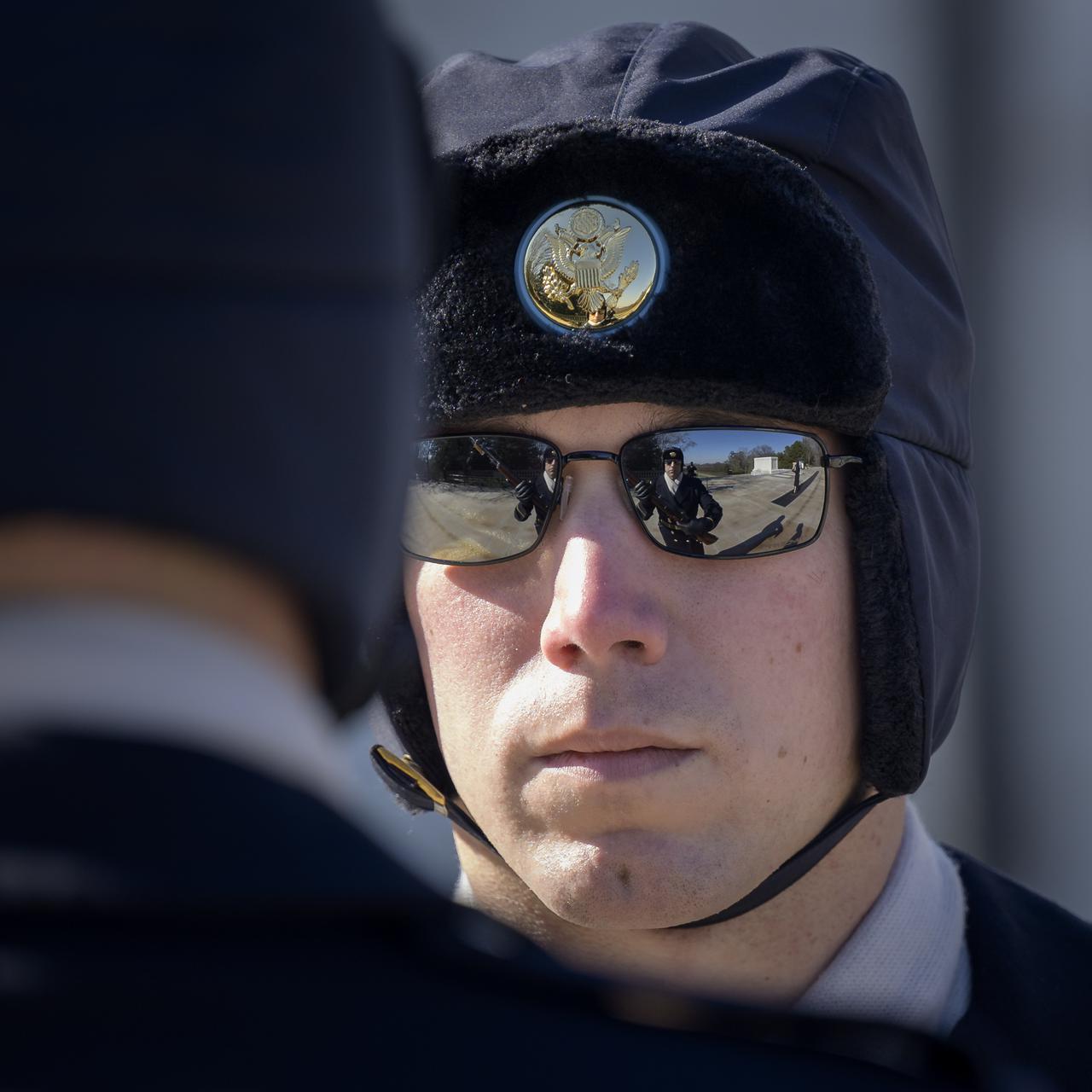 Members of The Old Guard, 3rd U.S. Infantry Regiment, are seen during a changing of the guard at the Tomb of the Unknowns ahead of a wreath laying ceremony during NASA's Day of Remembrance, Thursday, Jan. 27, 2022, at Arlington National Cemetery in Arlington, Va.  The wreaths were laid in memory of those men and women who lost their lives in the quest for space exploration.  Photo Credit: (NASA/Bill Ingalls)