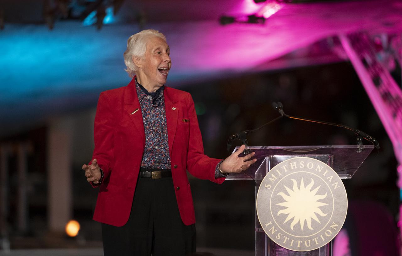 Wally Funk delivers remarks after accepting the 2022 Michael Collins Trophy for Lifetime Achievement, Thursday, March 24, 2022, at the Smithsonian National Air and Space Museum’s Steven F. Udvar-Hazy center in Chantilly, Va. The Smithsonian National Air and Space Museum’s Michael Collins Trophy recognizes extraordinary accomplishments in aeronautics and spaceflight. Photo Credit: (NASA/Joel Kowsky)