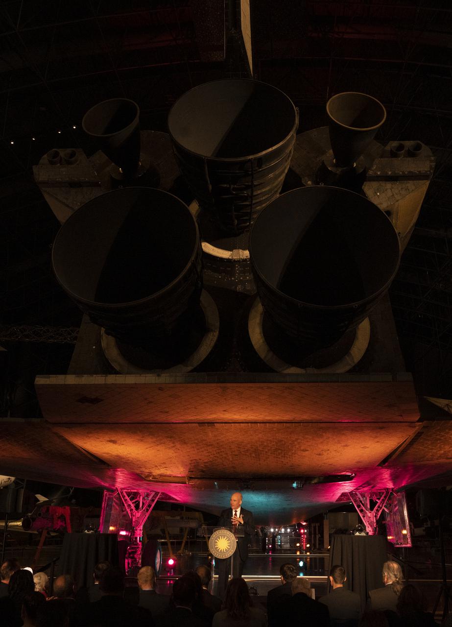 Christopher Browne, acting director of the Smithsonian’s National Air and Space Museum delivers opening remarks at the presentation of the 2022 Michael Collins Trophy, Thursday, March 24, 2022, at the Smithsonian National Air and Space Museum’s Steven F. Udvar-Hazy center in Chantilly, Va. The Smithsonian National Air and Space Museum’s Michael Collins Trophy recognizes extraordinary accomplishments in aeronautics and spaceflight. Photo Credit: (NASA/Joel Kowsky)