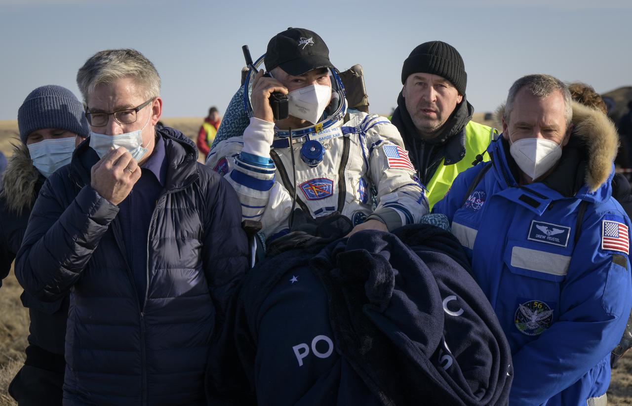 Expedition 66 NASA astronaut Mark Vande Hei is carried to a medical tent shortly after he and fellow crew mates Pyotr Dubrov and Anton Shkaplerov of Roscosmos landed in their Soyuz MS-19 spacecraft near the town of Zhezkazgan, Kazakhstan on Wednesday, March 30, 2022. Vande Hei and Dubrov are returning to Earth after logging 355 days in space as members of Expeditions 64-66 aboard the International Space Station. For Vande Hei, his mission is the longest single spaceflight by a U.S. astronaut in history. Shkaplerov is returning after 176 days in space, serving as a Flight Engineer for Expedition 65 and commander of Expedition 66. Photo Credit: (NASA/Bill Ingalls)