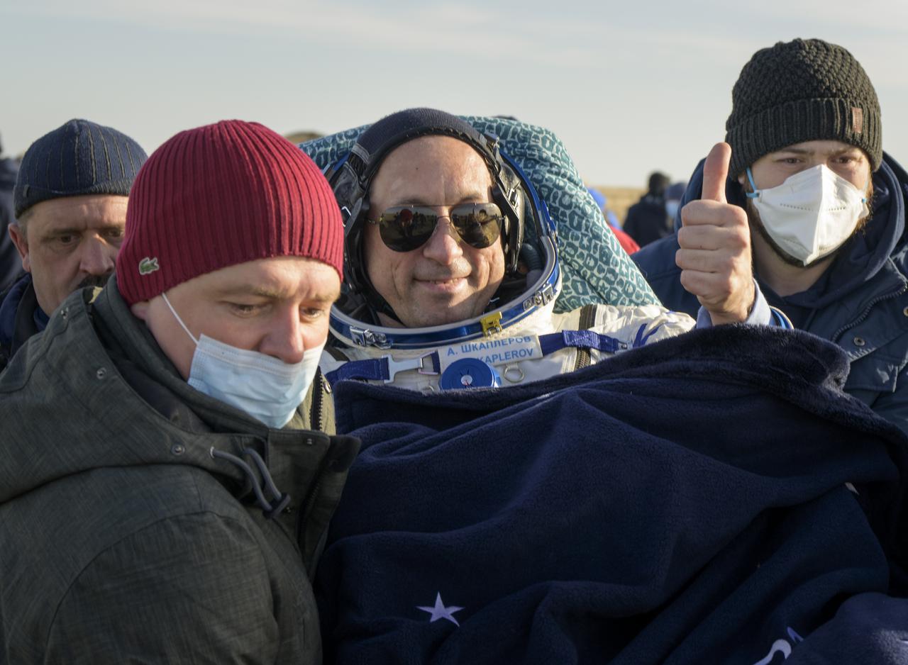 Expedition 66 Russian cosmonaut Anton Shkaplerov is carried to a medical tent shortly after he and fellow crew mates Mark Vande Hei of NASA and Pyotr Dubrov of Roscosmos landed in their Soyuz MS-19 spacecraft near the town of Zhezkazgan, Kazakhstan on Wednesday, March 30, 2022. Vande Hei and Dubrov are returning to Earth after logging 355 days in space as members of Expeditions 64-66 aboard the International Space Station. For Vande Hei, his mission is the longest single spaceflight by a U.S. astronaut in history. Shkaplerov is returning after 176 days in space, serving as a Flight Engineer for Expedition 65 and commander of Expedition 66. Photo Credit: (NASA/Bill Ingalls)