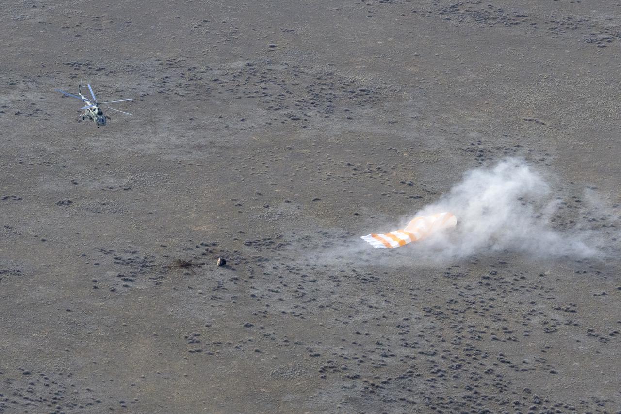 The Soyuz MS-19 spacecraft is seen as it lands in a remote area near the town of Zhezkazgan, Kazakhstan with Expedition 66 crew members Mark Vande Hei of NASA, and cosmonauts Pyotr Dubrov, and Anton Shkaplerov of Roscosmos, Wednesday, March 30, 2022. Vande Hei and Dubrov are returning to Earth after logging 355 days in space as members of Expeditions 64-66 aboard the International Space Station. For Vande Hei, his mission is the longest single spaceflight by a U.S. astronaut in history. Shkaplerov is returning after 176 days in space, serving as a Flight Engineer for Expedition 65 and commander of Expedition 66. Photo Credit: (NASA/Bill Ingalls)
