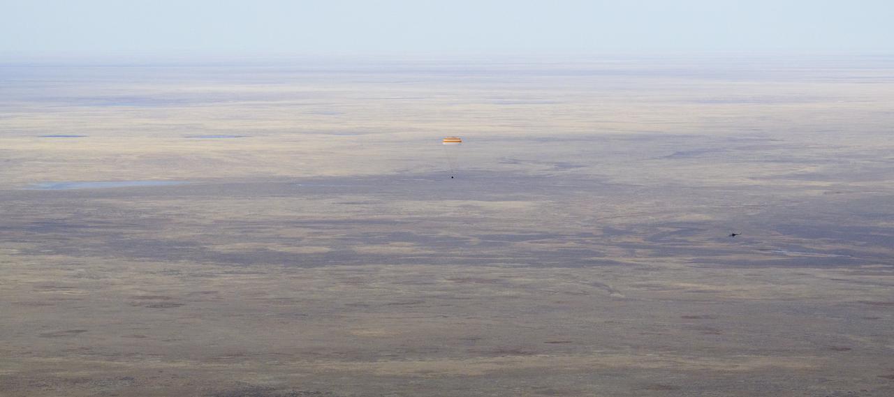 The Soyuz MS-19 spacecraft is seen as it lands in a remote area near the town of Zhezkazgan, Kazakhstan with Expedition 66 crew members Mark Vande Hei of NASA, and cosmonauts Pyotr Dubrov, and Anton Shkaplerov of Roscosmos, Wednesday, March 30, 2022. Vande Hei and Dubrov are returning to Earth after logging 355 days in space as members of Expeditions 64-66 aboard the International Space Station. For Vande Hei, his mission is the longest single spaceflight by a U.S. astronaut in history. Shkaplerov is returning after 176 days in space, serving as a Flight Engineer for Expedition 65 and commander of Expedition 66. Photo Credit: (NASA/Bill Ingalls)