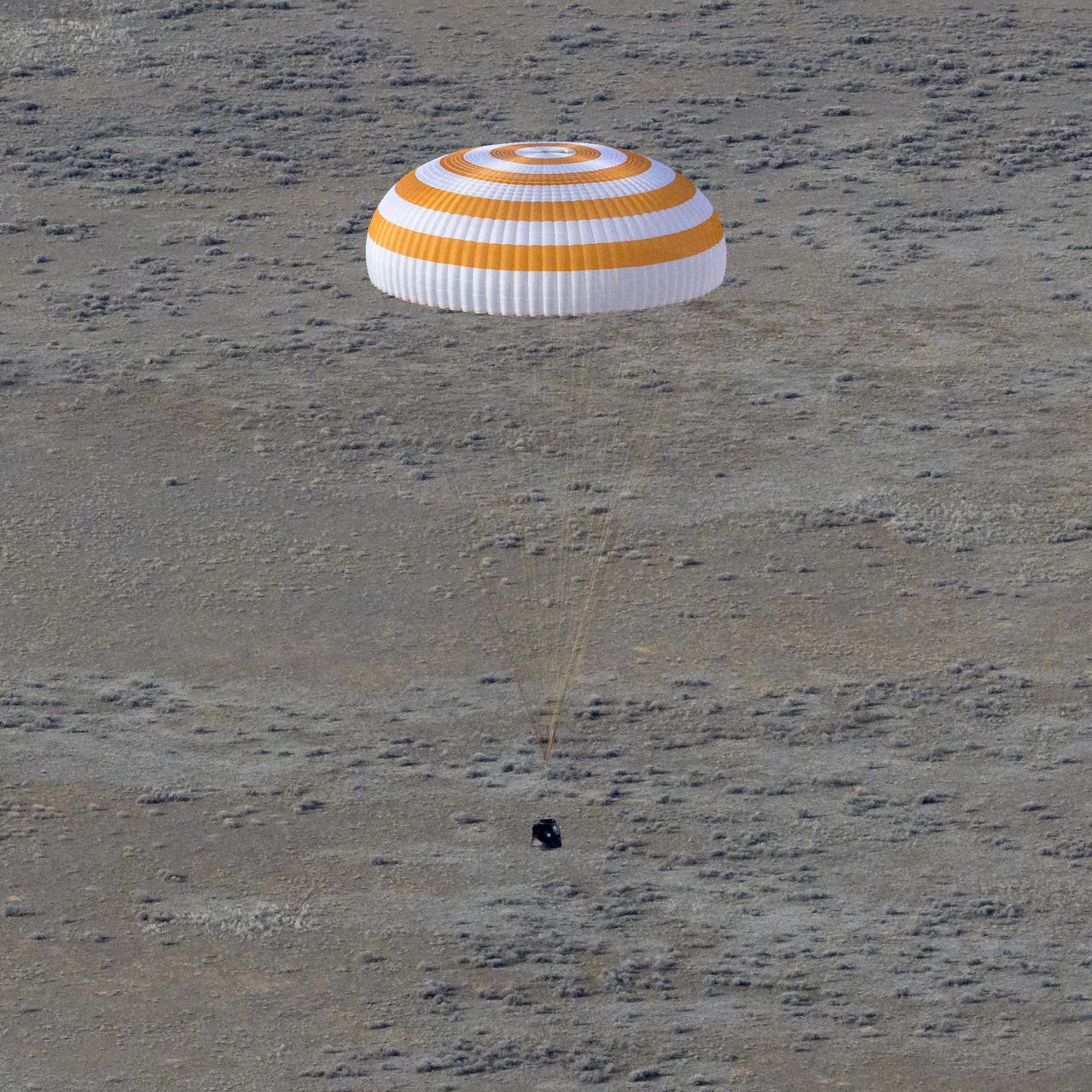 The Soyuz MS-19 spacecraft is seen as it lands in a remote area near the town of Zhezkazgan, Kazakhstan with Expedition 66 crew members Mark Vande Hei of NASA, and cosmonauts Pyotr Dubrov, and Anton Shkaplerov of Roscosmos, Wednesday, March 30, 2022. Vande Hei and Dubrov are returning to Earth after logging 355 days in space as members of Expeditions 64-66 aboard the International Space Station. For Vande Hei, his mission is the longest single spaceflight by a U.S. astronaut in history. Shkaplerov is returning after 176 days in space, serving as a Flight Engineer for Expedition 65 and commander of Expedition 66. Photo Credit: (NASA/Bill Ingalls)