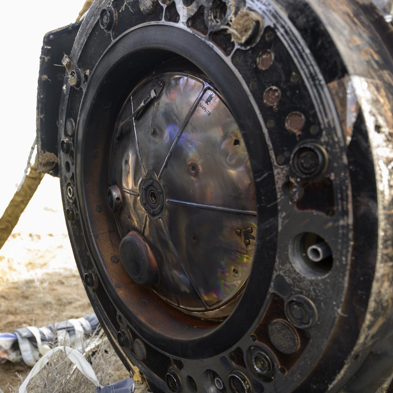 Russian Search and Rescue teams arrive at the Soyuz MS-19 spacecraft shortly after it landed in a remote area near the town of Zhezkazgan, Kazakhstan with Expedition 66 crew members Mark Vande Hei of NASA, and cosmonauts Pyotr Dubrov, and Anton Shkaplerov of Roscosmos, Wednesday, March 30, 2022. Vande Hei and Dubrov are returning to Earth after logging 355 days in space as members of Expeditions 64-66 aboard the International Space Station. For Vande Hei, his mission is the longest single spaceflight by a U.S. astronaut in history. Shkaplerov is returning after 176 days in space, serving as a Flight Engineer for Expedition 65 and commander of Expedition 66. Photo Credit: (NASA/Bill Ingalls)