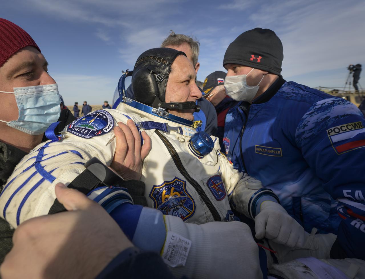 Expedition 66 Russian cosmonaut Anton Shkaplerov is helped out of the Soyuz MS-19 spacecraft just minutes after he, Russian cosmonaut Pyotr Dubrov, and NASA astronaut Mark Vande Hei, landed in a remote area near the town of Zhezkazgan, Kazakhstan on Wednesday, March 30, 2022. Vande Hei and Dubrov are returning to Earth after logging 355 days in space as members of Expeditions 64-66 aboard the International Space Station. For Vande Hei, his mission is the longest single spaceflight by a U.S. astronaut in history. Shkaplerov is returning after 176 days in space, serving as a Flight Engineer for Expedition 65 and commander of Expedition 66. Photo Credit: (NASA/Bill Ingalls)
