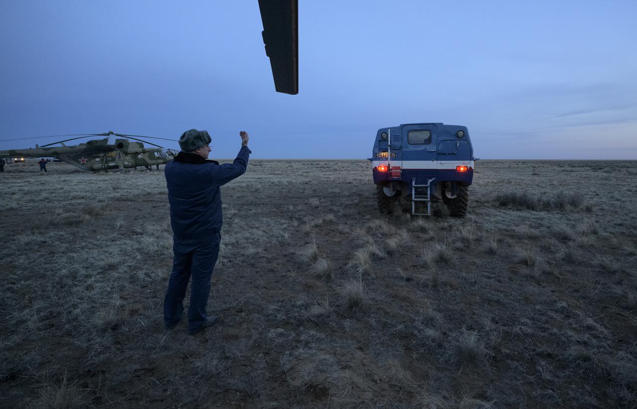 A Russian all terrain vehicle delivers Expedition 66 NASA astronaut Mark Vande Hei to an awaiting helicopter that will fly him to Karaganda after he and Russian cosmonauts Anton Shkaplerov and Pyotr Dubrov of Roscosmos, landed in their Soyuz MS-19 spacecraft near the town of Zhezkazgan, Kazakhstan on Wednesday, March 30, 2022. Vande Hei and Dubrov are returning to Earth after logging 355 days in space as members of Expeditions 64-66 aboard the International Space Station. For Vande Hei, his mission is the longest single spaceflight by a U.S. astronaut in history. Shkaplerov is returning after 176 days in space, serving as a Flight Engineer for Expedition 65 and commander of Expedition 66. Photo Credit: (NASA/Bill Ingalls)