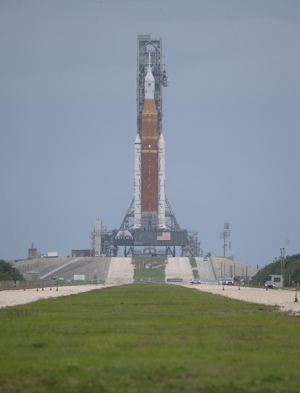 NASA’s Space Launch System (SLS) rocket with the Orion spacecraft aboard is seen atop a mobile launcher at Launch Complex 39B, Saturday, April 2, 2022, as the Artemis I launch team conducts the wet dress rehearsal test at NASA’s Kennedy Space Center in Florida. Ahead of NASA’s Artemis I flight test, the wet dress rehearsal will run the Artemis I launch team through operations to load propellant, conduct a full launch countdown, demonstrate the ability to recycle the countdown clock, and drain the tanks to practice timelines and procedures for launch.  Photo Credit: (NASA/Joel Kowsky)