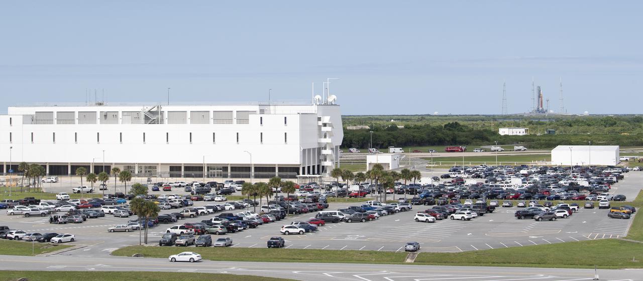 NASA’s Space Launch System (SLS) rocket with the Orion spacecraft aboard is seen atop a mobile launcher at Launch Complex 39B in this view of Rocco A. Petrone Launch Control Center, Monday, April 4, 2022, as the Artemis I launch team conducts the wet dress rehearsal test at NASA’s Kennedy Space Center in Florida. Ahead of NASA’s Artemis I flight test, the wet dress rehearsal will run the Artemis I launch team through operations to load propellant, conduct a full launch countdown, demonstrate the ability to recycle the countdown clock, and drain the tanks to practice timelines and procedures for launch.  Photo Credit: (NASA/Joel Kowsky)