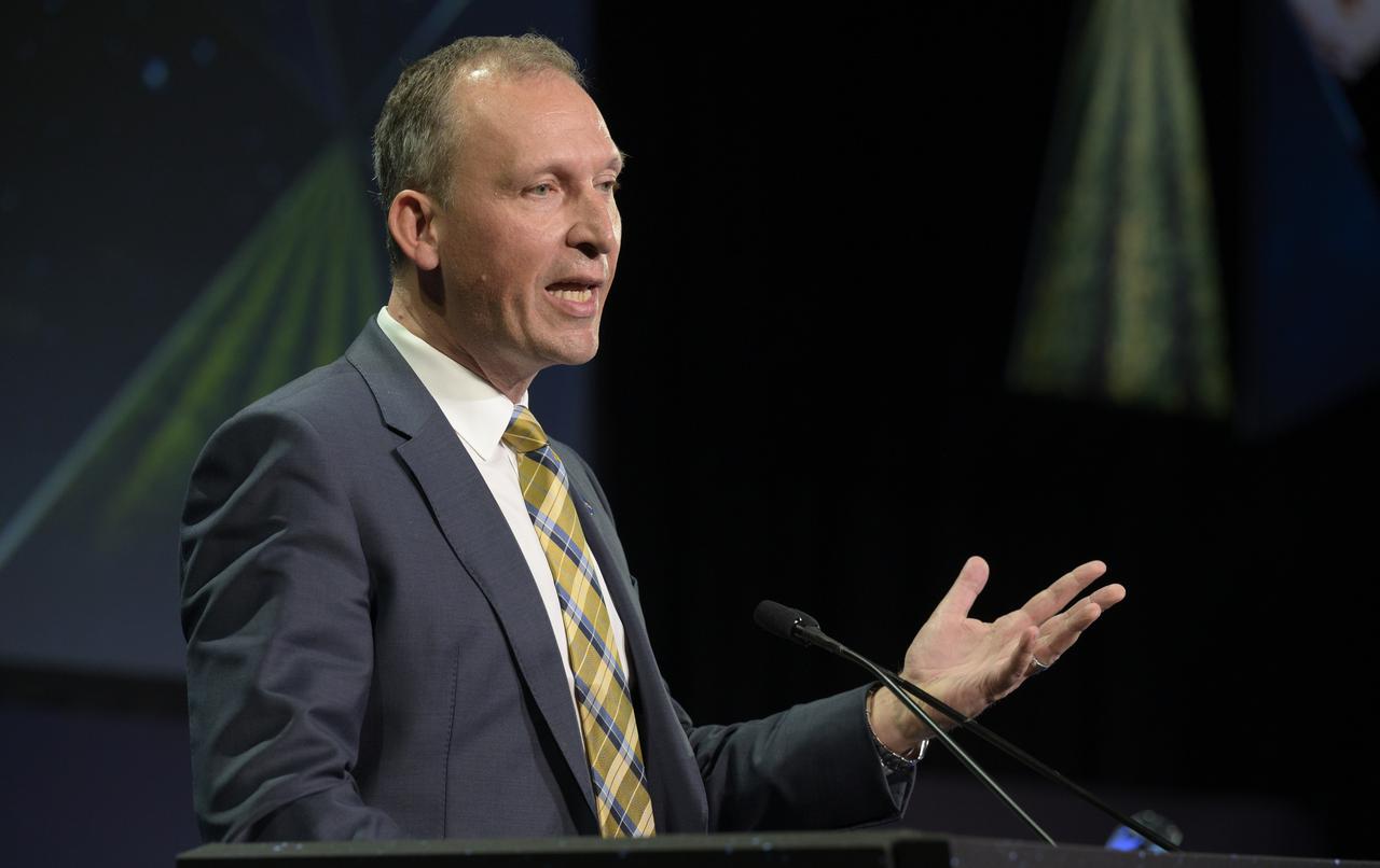 NASA Associate Administrator for Science Thomas Zurbuchen gives remarks after the 2022 John L. “Jack” Swigert, Jr., Award for Space Exploration was presented to the OSIRIS-REx team by the Space Foundation during the 37th Space Symposium, Monday, April 4, 2022, in Colorado Springs, Colorado. The John L. “Jack” Swigert, Jr., Award for Space Exploration recognizes extraordinary accomplishments by a company, space agency, or consortium of organizations in the realm of space exploration and discovery. The award honors the memory of astronaut John L. “Jack” Swigert, Jr., one of the inspirations for the creation of Space Foundation. Photo Credit: (NASA/Bill Ingalls)