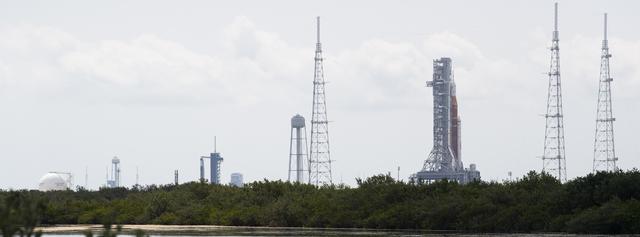 NASA image: NASA’s SLS and SpaceX’s Falcon 9 at Launch Complex 39A & 39B