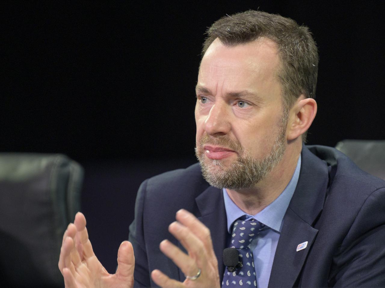 Dr. Paul Bate, Chief Executive Officer UK Space Agency (UKSA) speaks in a Heads of Agency panel during the 37th Space Symposium, Wednesday, April 6, 2022, in Colorado Springs, Colorado. Photo Credit: (NASA/Bill Ingalls)
