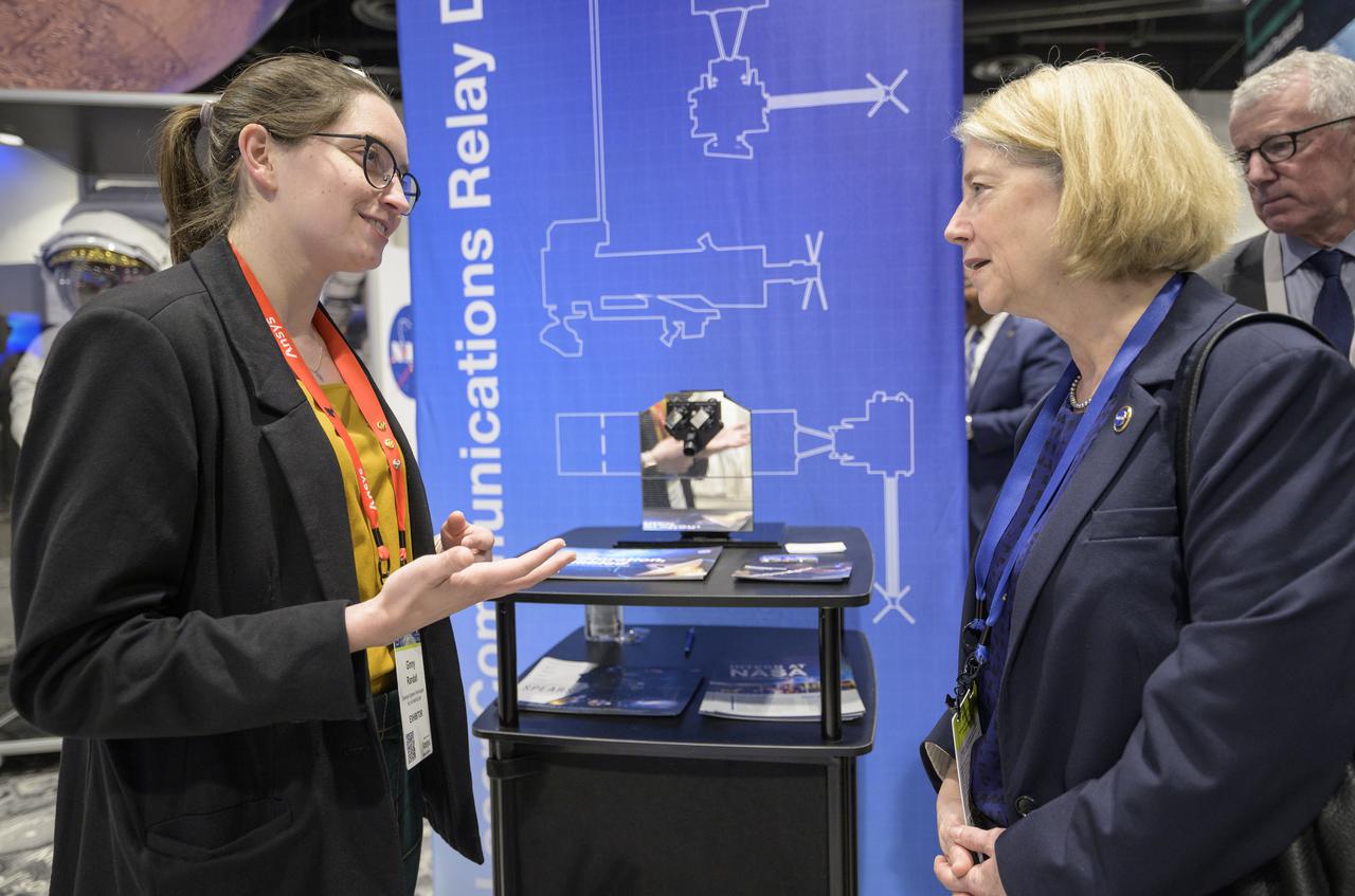 NASA Deputy Administrator Pam Melroy meets with colleagues at the NASA Exhibit area during the 37th Space Symposium, Wednesday, April 6, 2022, in Colorado Springs, Colorado. Photo Credit: (NASA/Bill Ingalls)