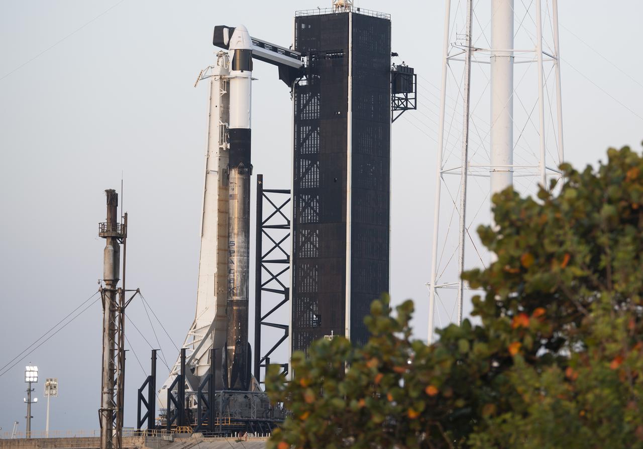 A SpaceX Falcon 9 rocket with the company's Crew Dragon spacecraft aboard is seen at sunrise on the launch pad at Launch Complex 39A as preparations continue for Axiom Mission 1 (Ax-1), Thursday, April 7, 2022, at NASA’s Kennedy Space Center in Florida. The Ax-1 mission is the first private astronaut mission to the International Space Station.  Ax-1 crew members Commander Michael López-Alegría of Spain and the United States, Pilot Larry Connor of the United States, and Mission Specialists Eytan Stibbe of Israel, and Mark Pathy of Canada are scheduled to launch on April 8 at 11:17 a.m. EDT, from Launch Complex 39A at the Kennedy Space Center. Photo Credit: (NASA/Joel Kowsky)