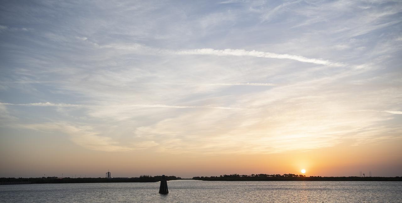 A SpaceX Falcon 9 rocket with the company's Crew Dragon spacecraft aboard is seen at sunrise on the launch pad at Launch Complex 39A as preparations continue for Axiom Mission 1 (Ax-1), Friday, April 8, 2022, at NASA’s Kennedy Space Center in Florida. The Ax-1 mission is the first private astronaut mission to the International Space Station.  Ax-1 crew members Commander Michael López-Alegría of Spain and the United States, Pilot Larry Connor of the United States, and Mission Specialists Eytan Stibbe of Israel, and Mark Pathy of Canada are scheduled to launch at 11:17 a.m. EDT from Launch Complex 39A at the Kennedy Space Center. Photo Credit: (NASA/Joel Kowsky)