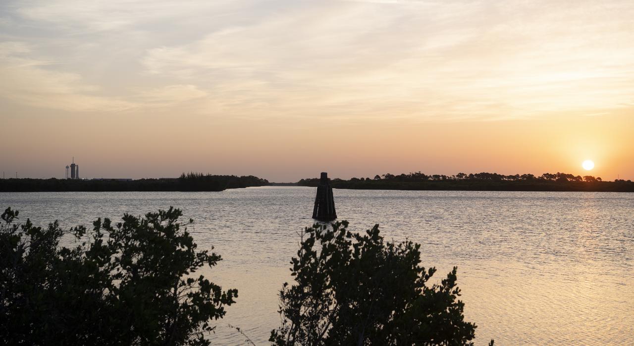A SpaceX Falcon 9 rocket with the company's Crew Dragon spacecraft aboard is seen at sunrise on the launch pad at Launch Complex 39A as preparations continue for Axiom Mission 1 (Ax-1), Friday, April 8, 2022, at NASA’s Kennedy Space Center in Florida. The Ax-1 mission is the first private astronaut mission to the International Space Station.  Ax-1 crew members Commander Michael López-Alegría of Spain and the United States, Pilot Larry Connor of the United States, and Mission Specialists Eytan Stibbe of Israel, and Mark Pathy of Canada are scheduled to launch at 11:17 a.m. EDT from Launch Complex 39A at the Kennedy Space Center. Photo Credit: (NASA/Joel Kowsky)