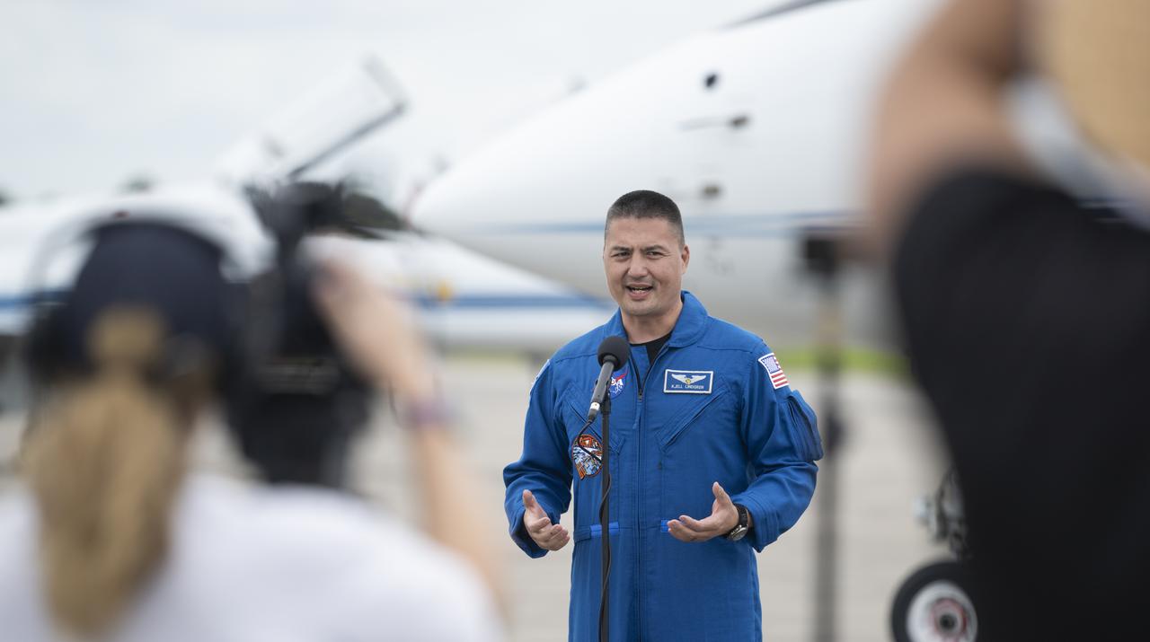 NASA astronaut Kjell Lindgren speaks to members of the media after arriving with fellow crewmates NASA astronauts Jessica Watkins, Robert Hines, and ESA (European Space Agency) astronaut Samantha Cristoforetti at the Launch and Landing Facility at NASA’s Kennedy Space Center ahead of SpaceX’s Crew-4 mission, Monday, April 18, 2022, in Florida. NASA’s SpaceX Crew-4 mission is the fourth crew rotation mission of the SpaceX Crew Dragon spacecraft and Falcon 9 rocket to the International Space Station as part of the agency’s Commercial Crew Program. Lindgren, Hines, Watkins, and Cristoforetti are scheduled to launch at April 23 at 5:26 a.m. EDT, from Launch Complex 39A at the Kennedy Space Center. Photo Credit: (NASA/Joel Kowsky)
