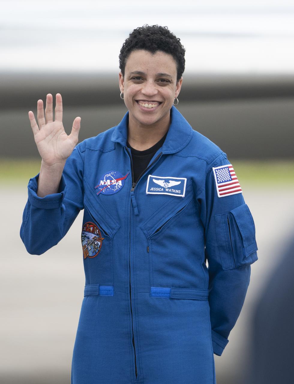 NASA astronaut Jessica Watkins is seen after arriving at the Launch and Landing Facility with fellow crewmates NASA astronauts Kjell Lindgren, Robert Hines, and ESA (European Space Agency) astronaut Samantha Cristoforetti at NASA’s Kennedy Space Center ahead of SpaceX’s Crew-4 mission, Monday, April 18, 2022, in Florida. NASA’s SpaceX Crew-4 mission is the fourth crew rotation mission of the SpaceX Crew Dragon spacecraft and Falcon 9 rocket to the International Space Station as part of the agency’s Commercial Crew Program. Lindgren, Hines, Watkins, and Cristoforetti are scheduled to launch at April 23 at 5:26 a.m. EDT, from Launch Complex 39A at the Kennedy Space Center. Photo Credit: (NASA/Joel Kowsky)