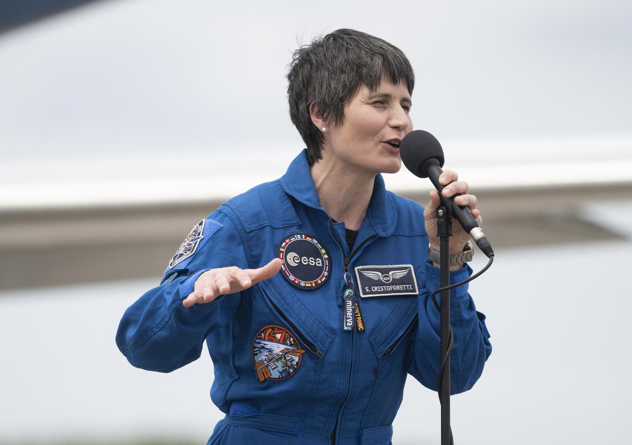 ESA (European Space Agency) astronaut Samantha Cristoforetti speaks to members of the media after arriving at the Launch and Landing Facility at NASA’s Kennedy Space Center with fellow crewmates NASA astronauts Kjell Lindgren, Robert Hines, and Jessica Watkins ahead of SpaceX’s Crew-4 mission, Monday, April 18, 2022, in Florida. NASA’s SpaceX Crew-4 mission is the fourth crew rotation mission of the SpaceX Crew Dragon spacecraft and Falcon 9 rocket to the International Space Station as part of the agency’s Commercial Crew Program. Lindgren, Hines, Watkins, and Cristoforetti are scheduled to launch at April 23 at 5:26 a.m. EDT, from Launch Complex 39A at the Kennedy Space Center. Photo Credit: (NASA/Joel Kowsky)