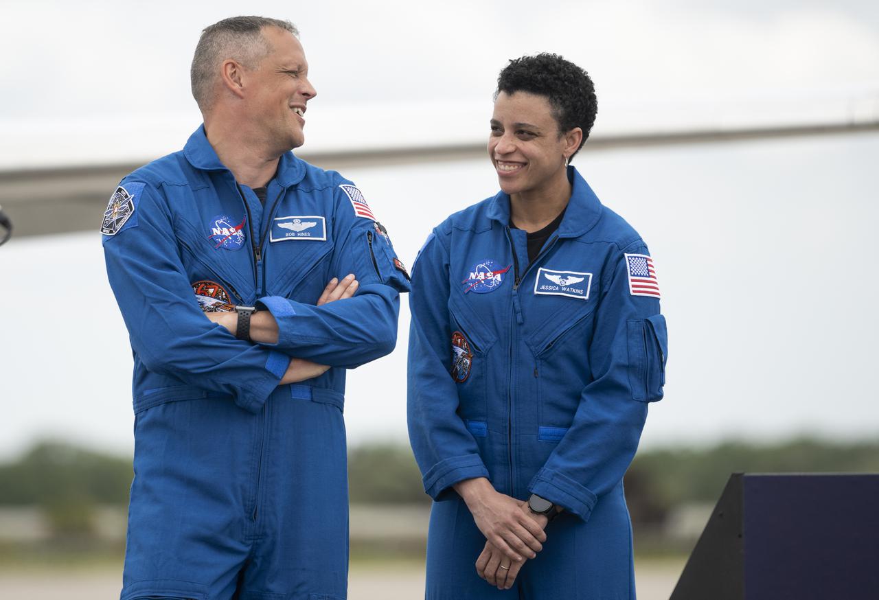 NASA astronauts Robert Hines, left, and Jessica Watkins, right, are seen after arriving at the Launch and Landing Facility at NASA’s Kennedy Space Center with fellow crewmates NASA astronaut Kjell Lindgren and ESA (European Space Agency) astronaut Samantha Cristoforetti ahead of SpaceX’s Crew-4 mission, Monday, April 18, 2022, in Florida. NASA’s SpaceX Crew-4 mission is the fourth crew rotation mission of the SpaceX Crew Dragon spacecraft and Falcon 9 rocket to the International Space Station as part of the agency’s Commercial Crew Program. Lindgren, Hines, Watkins, and Cristoforetti are scheduled to launch at April 23 at 5:26 a.m. EDT, from Launch Complex 39A at the Kennedy Space Center. Photo Credit: (NASA/Joel Kowsky)
