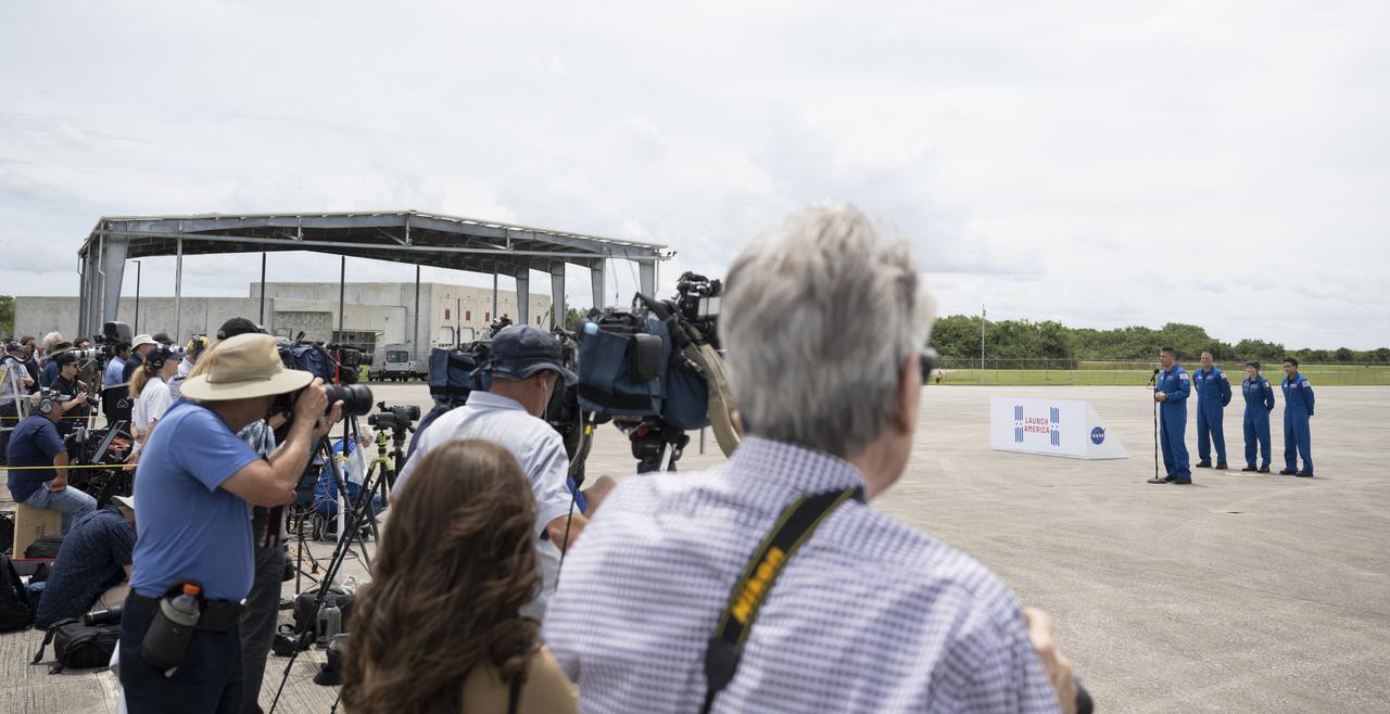 NASA astronauts Kjell Lindgren, Robert Hines, Jessica Watkins, and ESA (European Space Agency) astronaut Samantha Cristoforetti, speak to members of the media after arriving at the Launch and Landing Facility at NASA’s Kennedy Space Center ahead of SpaceX’s Crew-4 mission, Monday, April 18, 2022, in Florida. NASA’s SpaceX Crew-4 mission is the fourth crew rotation mission of the SpaceX Crew Dragon spacecraft and Falcon 9 rocket to the International Space Station as part of the agency’s Commercial Crew Program. Lindgren, Hines, Watkins, and Cristoforetti are scheduled to launch at April 23 at 5:26 a.m. EDT, from Launch Complex 39A at the Kennedy Space Center. Photo Credit: (NASA/Joel Kowsky)