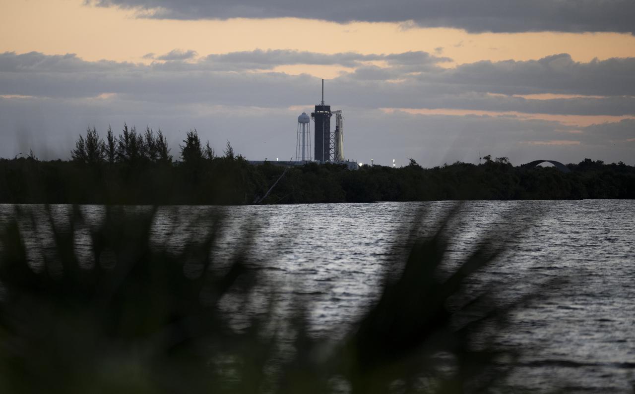 A SpaceX Falcon 9 rocket with the company's Crew Dragon spacecraft onboard is seen at sunrise on the launch pad at Launch Complex 39A as preparations continue for the Crew-4 mission, Wednesday, April 20, 2022, at NASA’s Kennedy Space Center in Florida. NASA’s SpaceX Crew-4 mission is the fourth crew rotation mission of the SpaceX Crew Dragon spacecraft and Falcon 9 rocket to the International Space Station as part of the agency’s Commercial Crew Program. NASA astronauts Kjell Lindgren, Robert Hines, Jessica Watkins, and ESA (European Space Agency) astronaut Samantha Cristoforetti are scheduled to launch on April 23 at 5:26 a.m. EDT, from Launch Complex 39A at the Kennedy Space Center. Photo Credit: (NASA/Joel Kowsky)