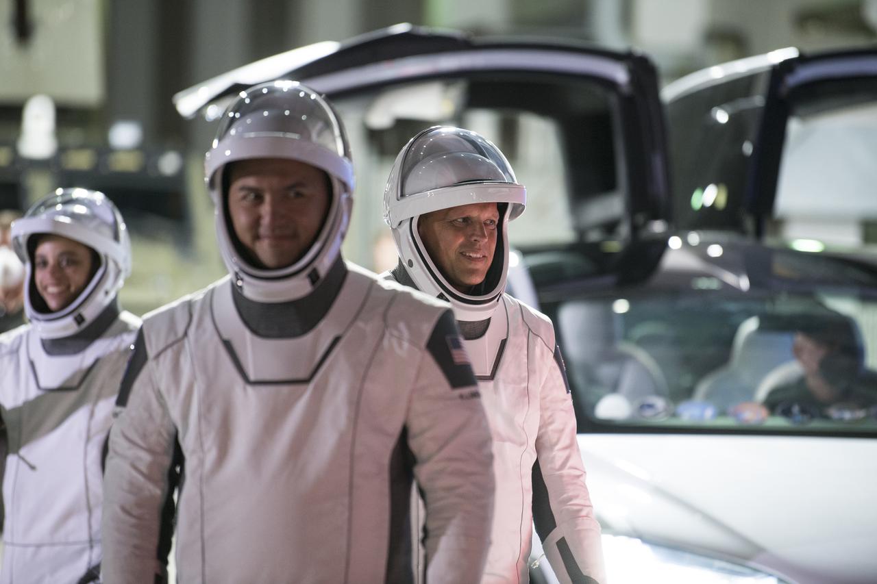 From left to right, NASA astronauts Jessica Watkins, Kjell Lindgren, and Robert Hines, and ESA (European Space Agency) astronaut Samantha Cristoforetti (not pictured), wearing SpaceX spacesuits, are seen as they prepare to depart the Neil  A. Armstrong Operations and Checkout Building for Launch Complex 39A  during a dress rehearsal prior to the Crew-4 mission launch, Wednesday, April 20, 2022, at NASA’s Kennedy Space Center in Florida. NASA’s SpaceX Crew-4 mission is the fourth crew rotation mission of the SpaceX Crew Dragon spacecraft and Falcon 9 rocket to the International Space Station as part of the agency’s Commercial Crew Program. Lindgren, Hines, Watkins, and Cristoforetti are scheduled to launch on April 23 at 5:26 a.m. EDT, from Launch Complex 39A at the Kennedy Space Center. Photo Credit: (NASA/Aubrey Gemignani)