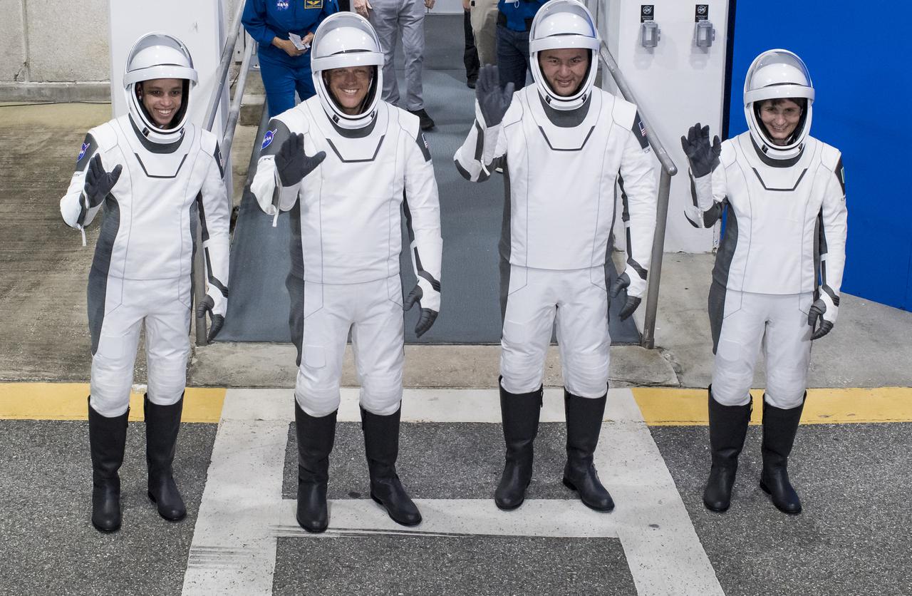 From left to right, NASA astronauts Jessica Watkins, Robert Hines, and Kjell Lindgren, and ESA (European Space Agency) astronaut Samantha Cristoforetti, wearing SpaceX spacesuits, are seen as they prepare to depart the Neil  A. Armstrong Operations and Checkout Building for Launch Complex 39A during a dress rehearsal prior to the Crew-4 mission launch, Wednesday, April 20, 2022, at NASA’s Kennedy Space Center in Florida. NASA’s SpaceX Crew-4 mission is the fourth crew rotation mission of the SpaceX Crew Dragon spacecraft and Falcon 9 rocket to the International Space Station as part of the agency’s Commercial Crew Program. Lindgren, Hines, Watkins, and Cristoforetti are scheduled to launch on April 23 at 5:26 a.m. EDT, from Launch Complex 39A at the Kennedy Space Center. Photo Credit: (NASA/Aubrey Gemignani)