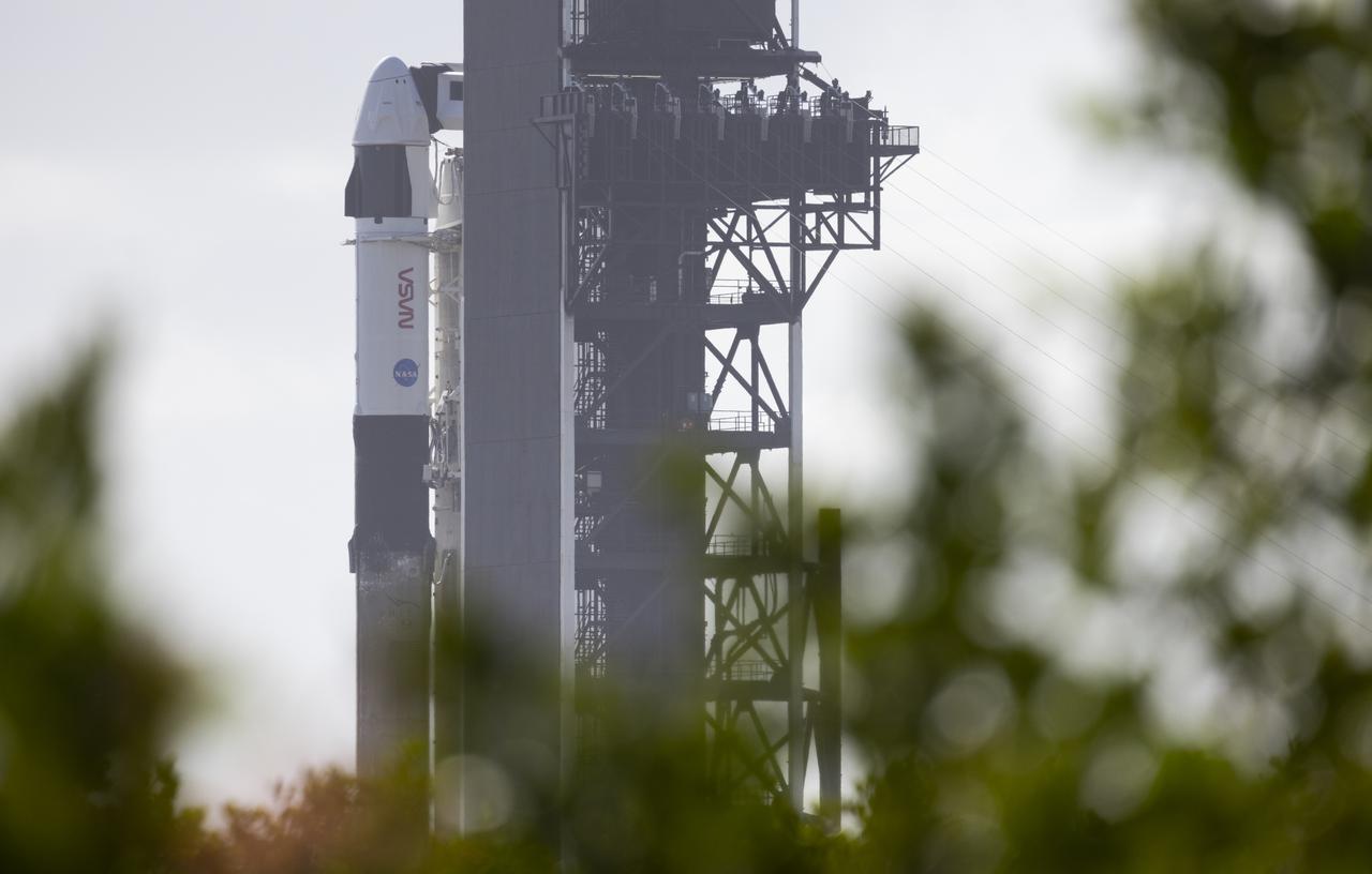 A SpaceX Falcon 9 rocket with the company's Crew Dragon spacecraft onboard is seen on the launch pad at Launch Complex 39A as preparations continue for the Crew-4 mission, Friday, April 22, 2022, at NASA’s Kennedy Space Center in Florida. NASA’s SpaceX Crew-4 mission is the fourth crew rotation mission of the SpaceX Crew Dragon spacecraft and Falcon 9 rocket to the International Space Station as part of the agency’s Commercial Crew Program. NASA astronauts Kjell Lindgren, Robert Hines, Jessica Watkins, and ESA (European Space Agency) astronaut Samantha Cristoforetti are scheduled to launch no earlier than April 26, from Launch Complex 39A at the Kennedy Space Center. Photo Credit: (NASA/Joel Kowsky)