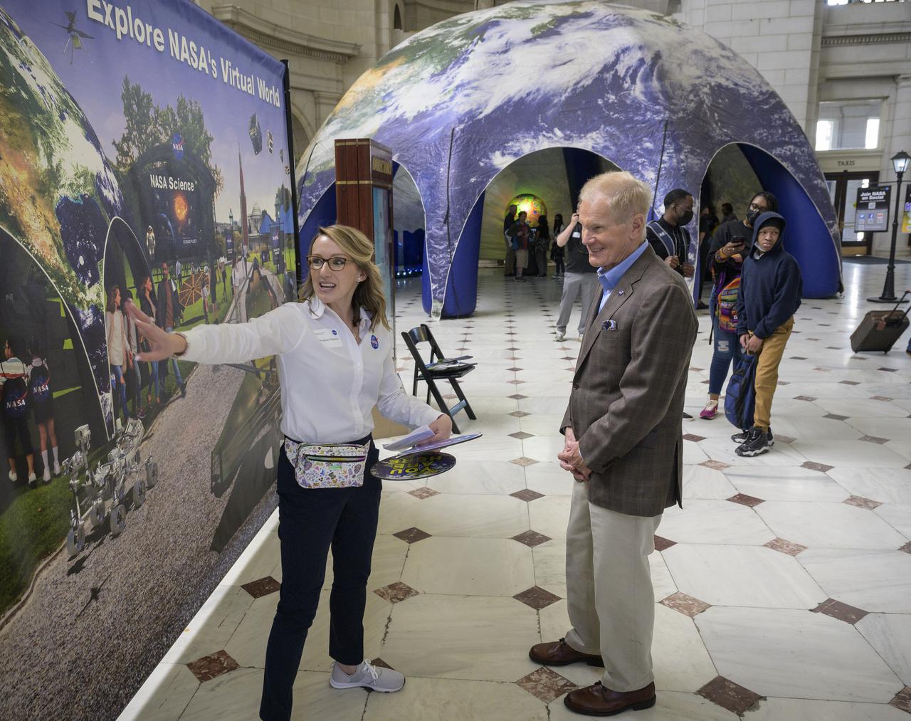 NASA Administrator Bill Nelson, right, talks with Heather Hanson from NASA’s Goddard Space Flight Center about Earth Day and the interactive exhibits NASA has featured inside Union Station in Washington, Friday, April 22, 2022. Photo Credit: (NASA/Bill Ingalls)
