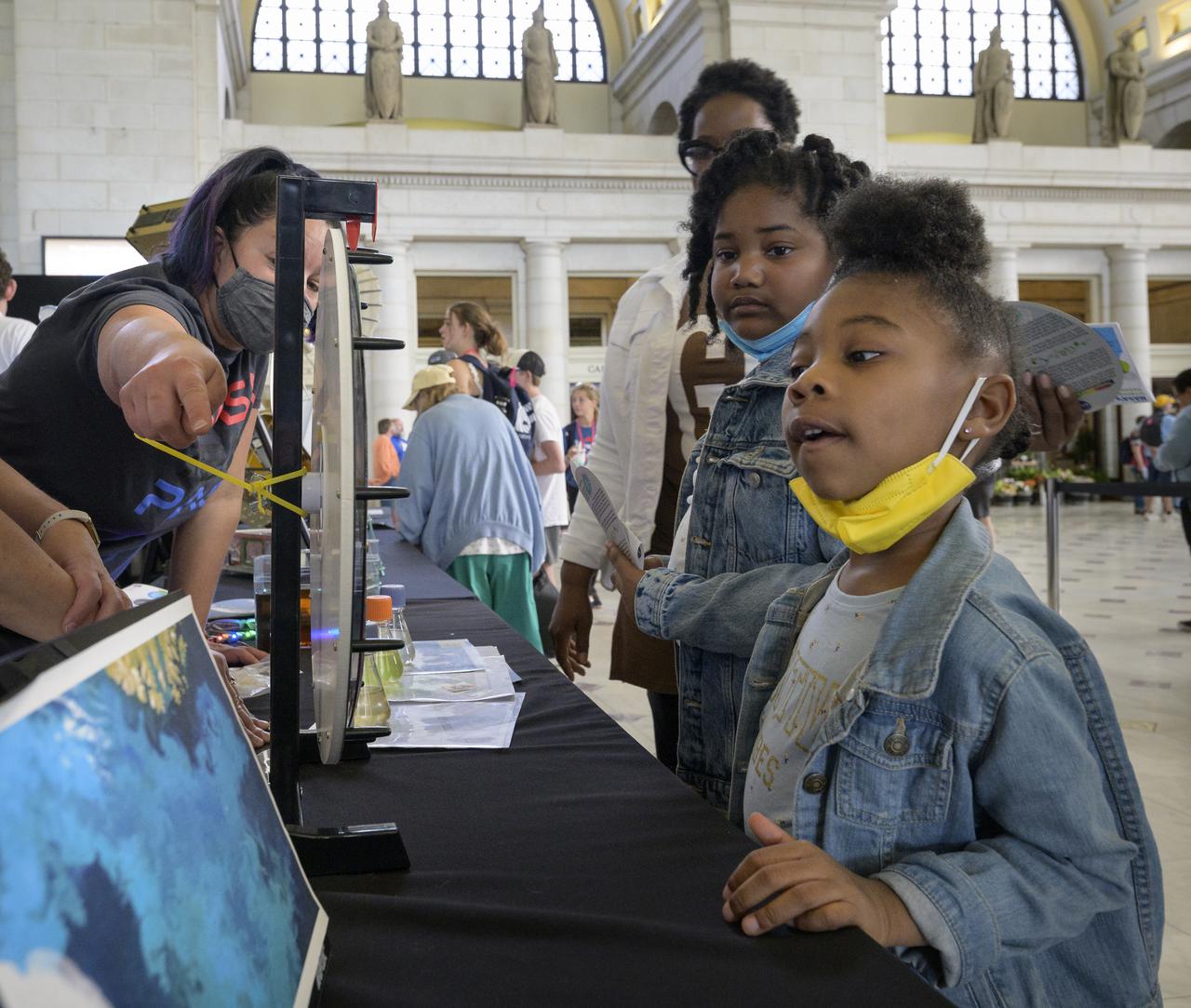 Visitors explore NASA’s hands-on exhibits during Earth Day, Friday, April 22, 2022, at Union Station in Washington. Photo Credit: (NASA/Bill Ingalls)