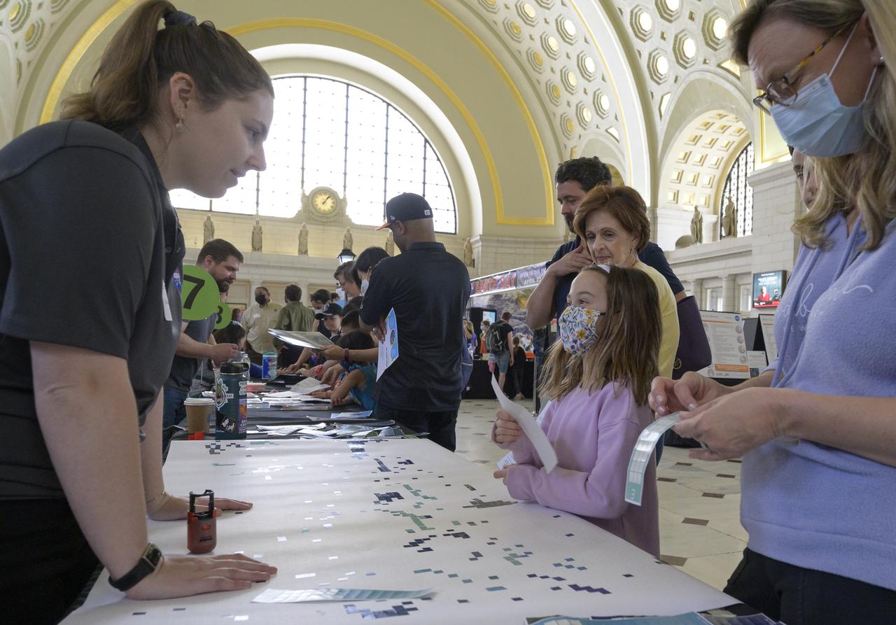 Visitors explore NASA’s hands-on exhibits during Earth Day, Friday, April 22, 2022, at Union Station in Washington. Photo Credit: (NASA/Bill Ingalls)