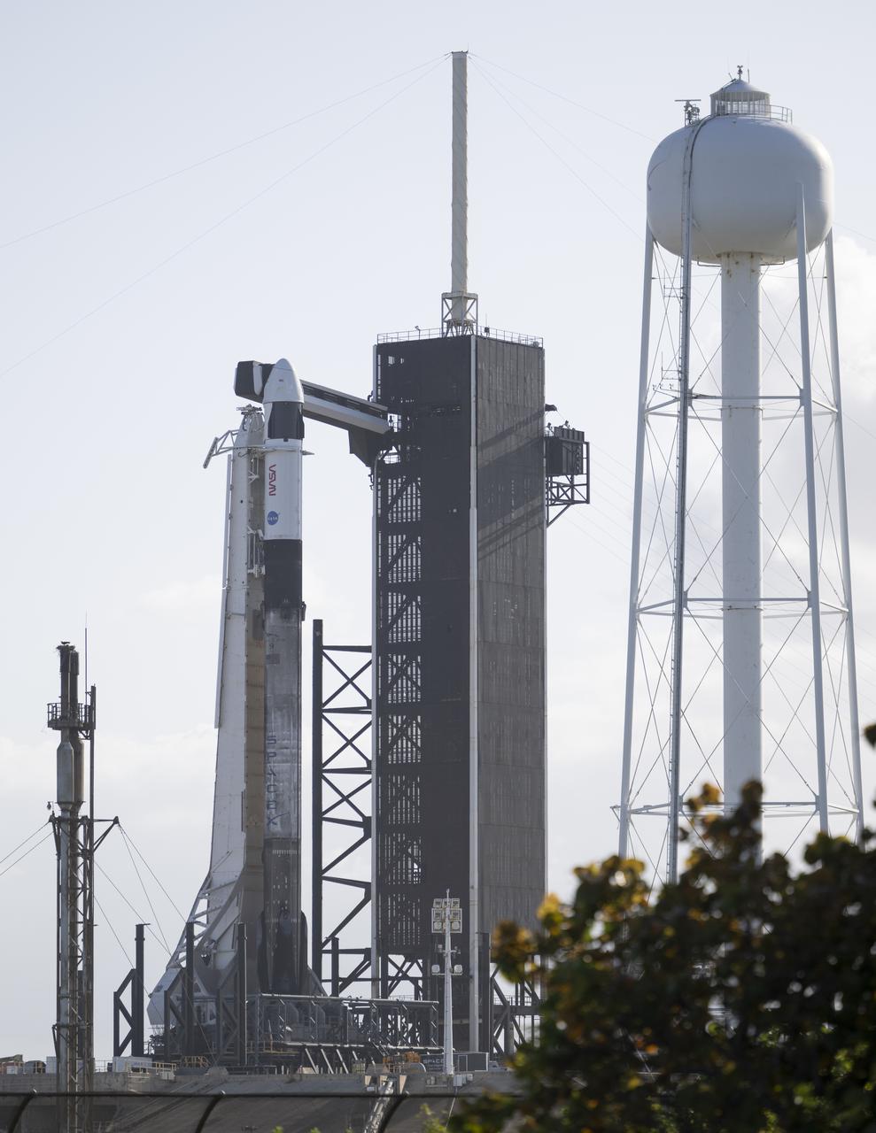 A SpaceX Falcon 9 rocket with the company's Crew Dragon spacecraft onboard is seen on the launch pad at Launch Complex 39A as preparations continue for the Crew-4 mission, Saturday, April 23, 2022, at NASA’s Kennedy Space Center in Florida. NASA’s SpaceX Crew-4 mission is the fourth crew rotation mission of the SpaceX Crew Dragon spacecraft and Falcon 9 rocket to the International Space Station as part of the agency’s Commercial Crew Program. NASA astronauts Kjell Lindgren, Robert Hines, Jessica Watkins, and ESA (European Space Agency) astronaut Samantha Cristoforetti are scheduled to launch no earlier than April 27 from Launch Complex 39A at the Kennedy Space Center. Photo Credit: (NASA/Joel Kowsky)