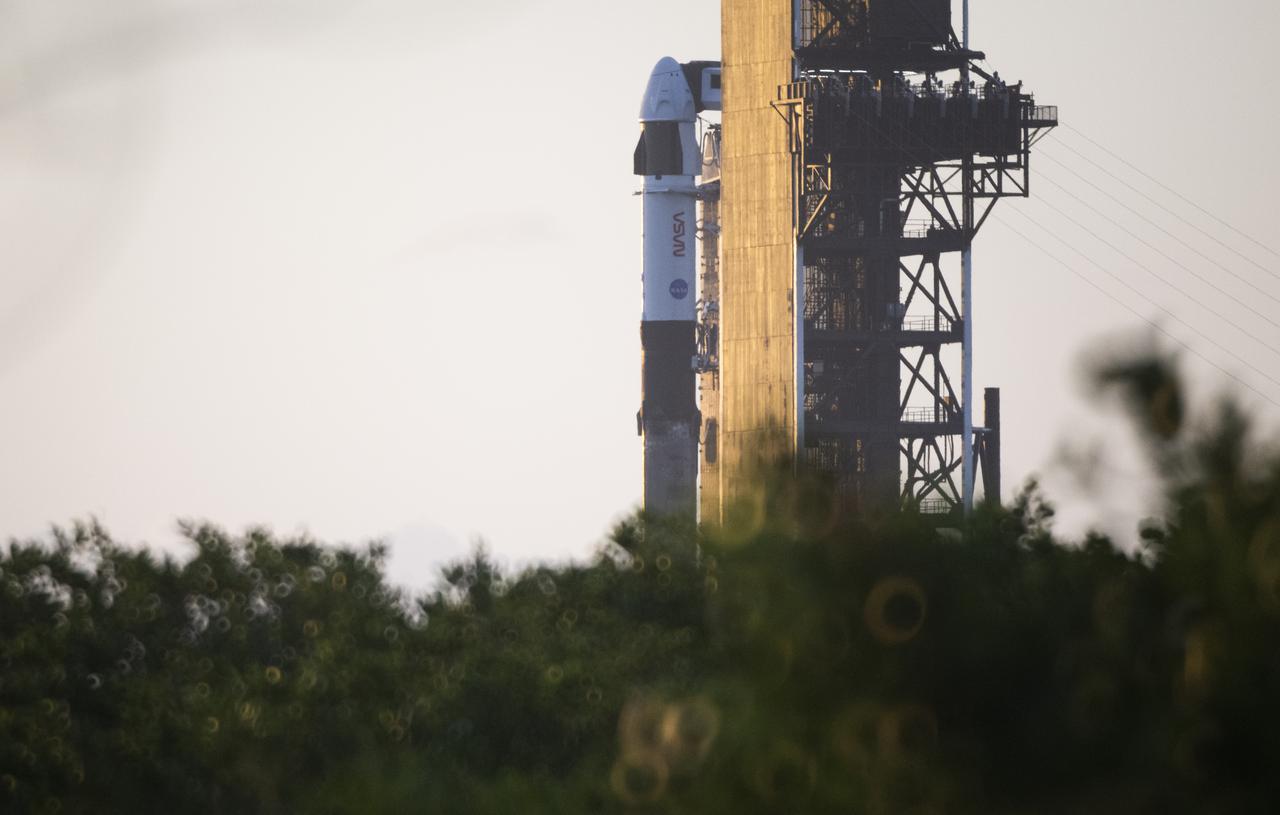 A SpaceX Falcon 9 rocket with the company's Crew Dragon spacecraft onboard is seen on the launch pad at Launch Complex 39A as preparations continue for the Crew-4 mission, Monday, April 25, 2022, at NASA’s Kennedy Space Center in Florida. NASA’s SpaceX Crew-4 mission is the fourth crew rotation mission of the SpaceX Crew Dragon spacecraft and Falcon 9 rocket to the International Space Station as part of the agency’s Commercial Crew Program. NASA astronauts Kjell Lindgren, Robert Hines, Jessica Watkins, and ESA (European Space Agency) astronaut Samantha Cristoforetti are scheduled to launch no earlier than April 27 from Launch Complex 39A at the Kennedy Space Center. Photo Credit: (NASA/Joel Kowsky)