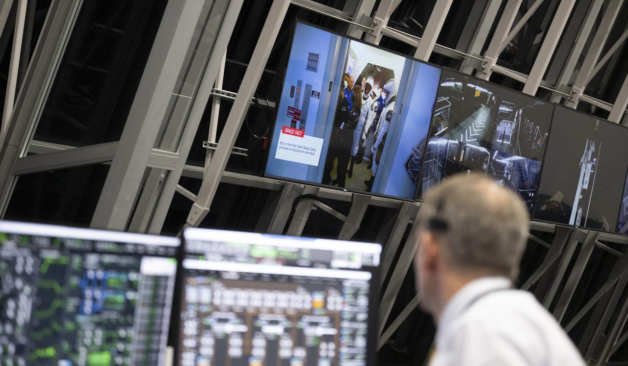 NASA astronauts Kjell Lindgren, Robert Hines, Jessica Watkins, and ESA (European Space Agency) astronaut Samantha Cristoforetti are seen as they depart the Neil A. Armstrong Operations and Checkout Building on a monitor inside firing room four, Wednesday, April 27, 2022, in the Rocco A. Petrone Launch Control Center at NASA’s Kennedy Space Center in Florida. NASA’s SpaceX Crew-4 mission is the fourth crew rotation mission of the SpaceX Crew Dragon spacecraft and Falcon 9 rocket to the International Space Station as part of the agency’s Commercial Crew Program. Lindgren, Hines, Watkins, and Cristoforetti launched at 3:52 a.m. ET, from Launch Complex 39A at the Kennedy Space Center to begin a six month mission onboard the International Space Station. Photo Credit: (NASA/Joel Kowsky)