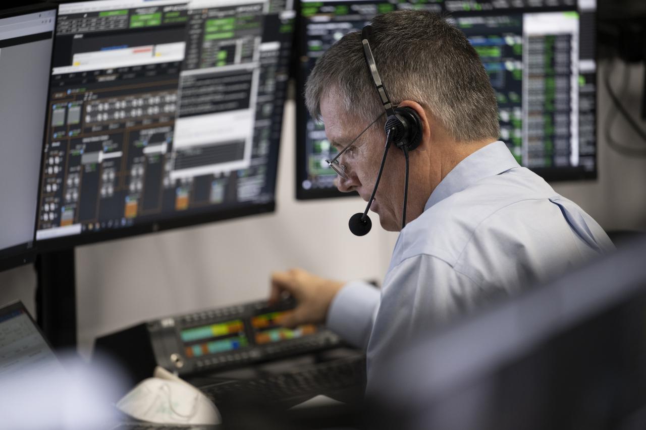 Steve Stich, manager of NASA’s Commercial Crew Program, monitors the countdown of the launch of a SpaceX Falcon 9 rocket carrying the company's Crew Dragon spacecraft on NASA’s SpaceX Crew-4 mission with NASA astronauts Kjell Lindgren, Robert Hines, Jessica Watkins, and ESA (European Space Agency) astronaut Samantha Cristoforetti onboard, Wednesday, April 27, 2022, in firing room four of the Rocco A. Petrone Launch Control Center at NASA’s Kennedy Space Center in Florida. NASA’s SpaceX Crew-4 mission is the fourth crew rotation mission of the SpaceX Crew Dragon spacecraft and Falcon 9 rocket to the International Space Station as part of the agency’s Commercial Crew Program. Lindgren, Hines, Watkins, and Cristoforetti launched at 3:52 a.m. ET, from Launch Complex 39A at the Kennedy Space Center. Photo Credit: (NASA/Joel Kowsky)