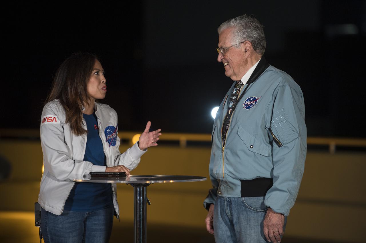 Apollo 17 astronaut, Harrison Schmitt, right, is interviewed by Kennedy Space Center public affairs officer, Megan Cruz, at the Operations Support Building II prior to the launch of a SpaceX Falcon 9 rocket carrying the company's Crew Dragon spacecraft on NASA’s SpaceX Crew-4 mission with NASA astronauts Kjell Lindgren, Robert Hines, Jessica Watkins, and ESA (European Space Agency) astronaut Samantha Cristoforetti onboard, Wednesday, April 27, 2022, at NASA’s Kennedy Space Center in Florida. NASA’s SpaceX Crew-4 mission is the fourth crew rotation mission of the SpaceX Crew Dragon spacecraft and Falcon 9 rocket to the International Space Station as part of the agency’s Commercial Crew Program. Lindgren, Hines, Watkins, and Cristoforetti launched at 3:52 a.m. ET from Launch Complex 39A at the Kennedy Space Center to begin a six month mission onboard the orbital outpost. Photo Credit: (NASA/Aubrey Gemignani)