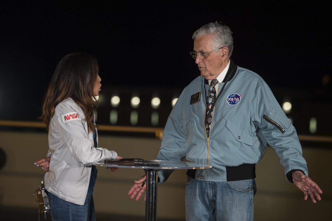 Apollo 17 astronaut, Harrison Schmitt, right, is interviewed by Kennedy Space Center public affairs officer, Megan Cruz, at the Operations Support Building II prior to the launch of a SpaceX Falcon 9 rocket carrying the company's Crew Dragon spacecraft on NASA’s SpaceX Crew-4 mission with NASA astronauts Kjell Lindgren, Robert Hines, Jessica Watkins, and ESA (European Space Agency) astronaut Samantha Cristoforetti onboard, Wednesday, April 27, 2022, at NASA’s Kennedy Space Center in Florida. NASA’s SpaceX Crew-4 mission is the fourth crew rotation mission of the SpaceX Crew Dragon spacecraft and Falcon 9 rocket to the International Space Station as part of the agency’s Commercial Crew Program. Lindgren, Hines, Watkins, and Cristoforetti launched at 3:52 a.m. ET from Launch Complex 39A at the Kennedy Space Center to begin a six month mission onboard the orbital outpost. Photo Credit: (NASA/Aubrey Gemignani)