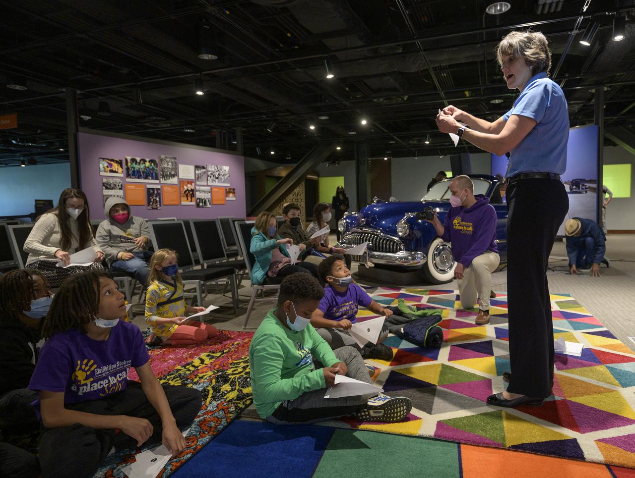 Cindy Hasselbring, NASA K-12 Education Advisor at NASA’s Office of STEM Engagement, teaches students about aeronautics and testing during a presentation, Thursday, April 28, 2022, at the National Museum of African American History and Culture in Washington. Photo Credit: (NASA/Bill Ingalls)